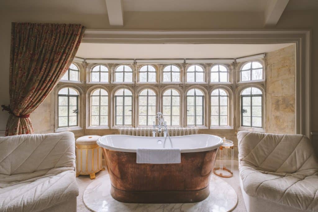 a bedroom with a large window