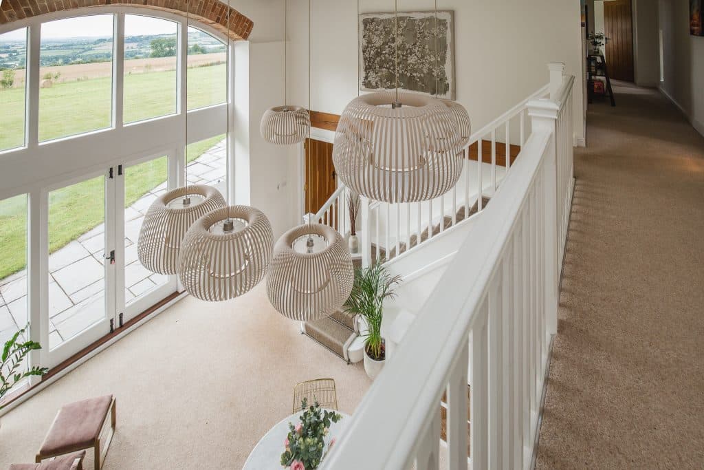 a living room filled with furniture and a window