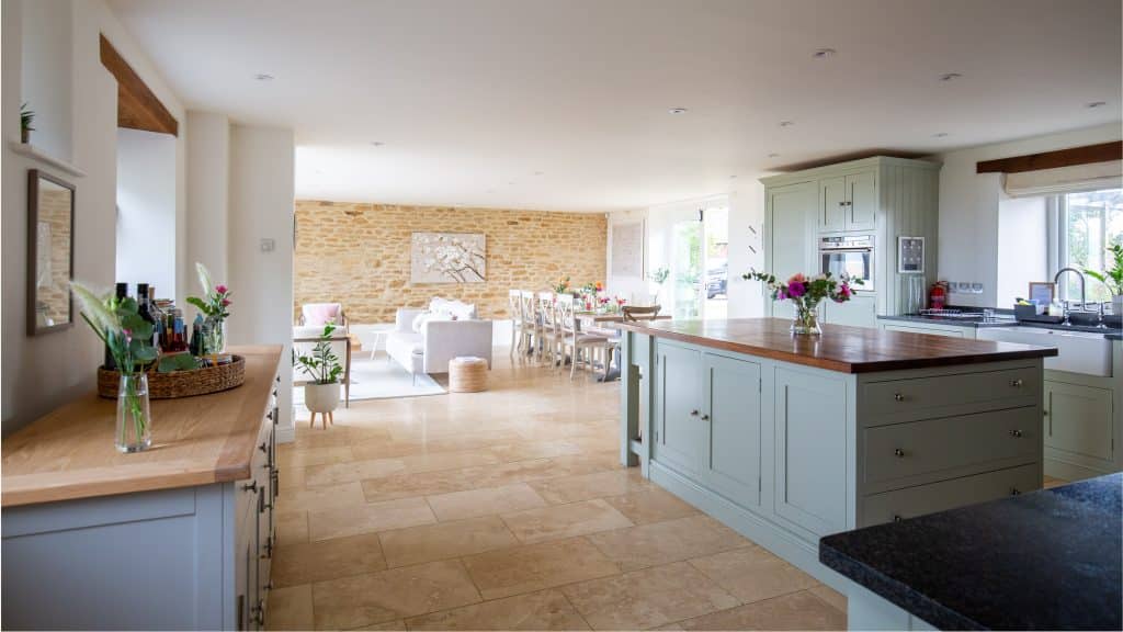 a kitchen with an island in the middle of a room