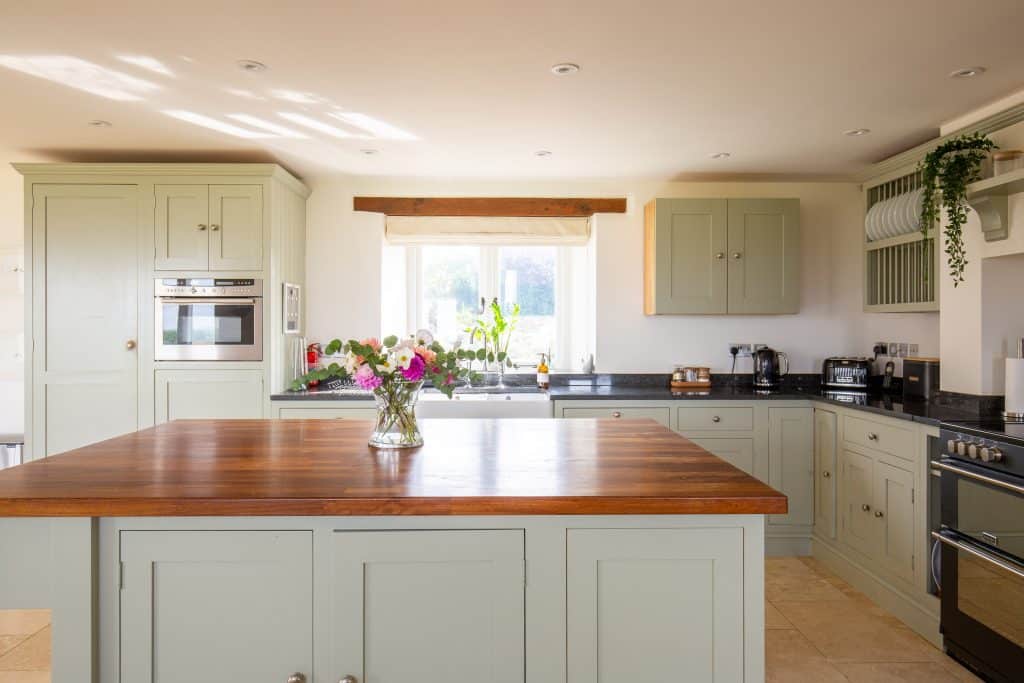 an island in the middle of a kitchen