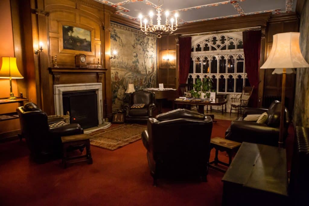 a living room filled with furniture and a fireplace