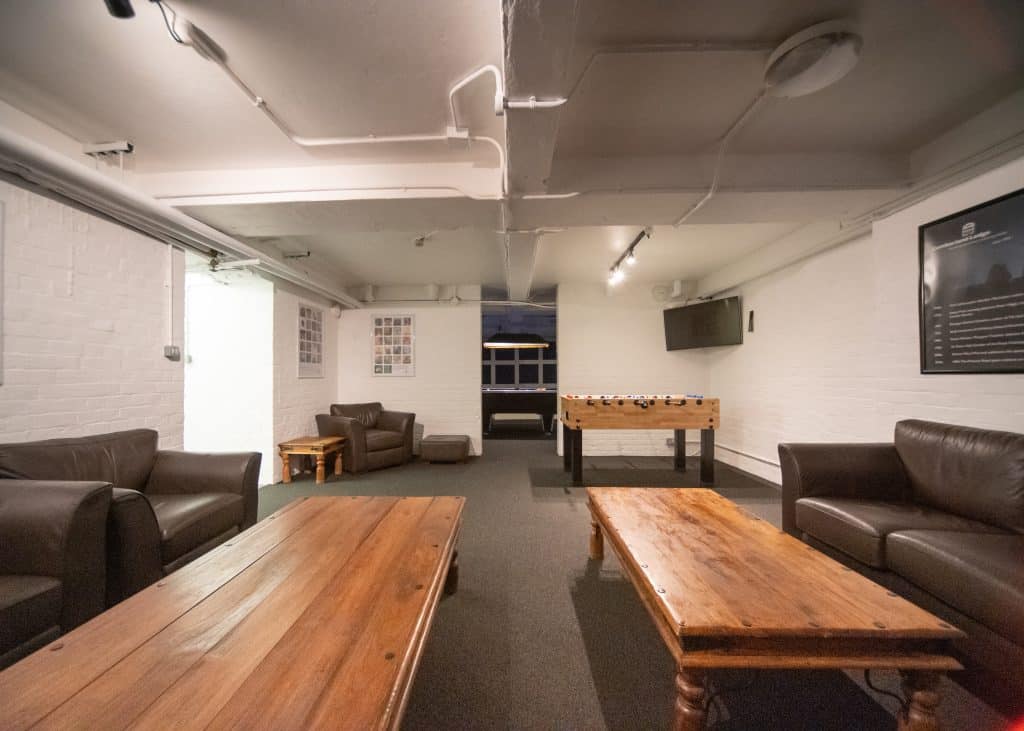 a room filled with furniture and a table
