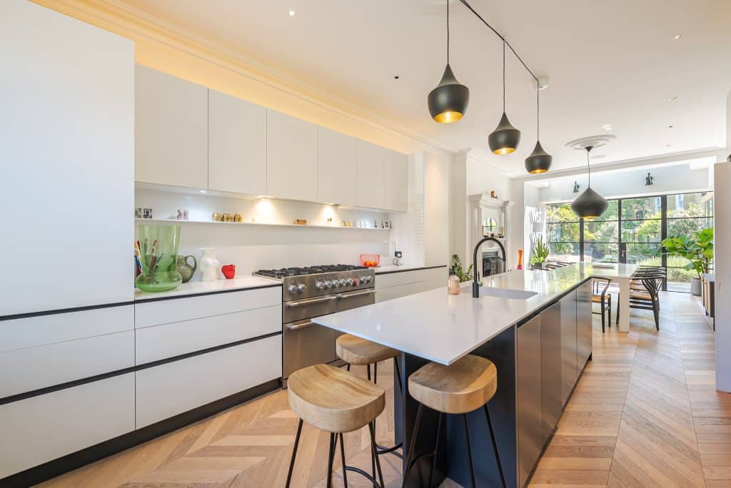 a kitchen with a dining room table