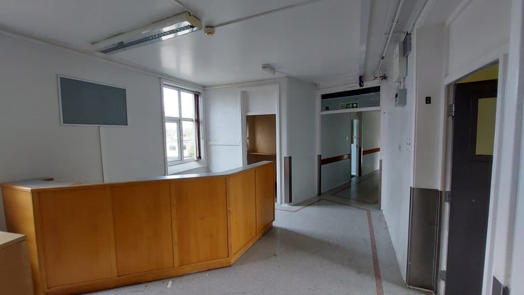 a room with a large mirror