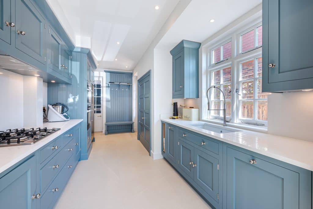 a kitchen with a tile floor