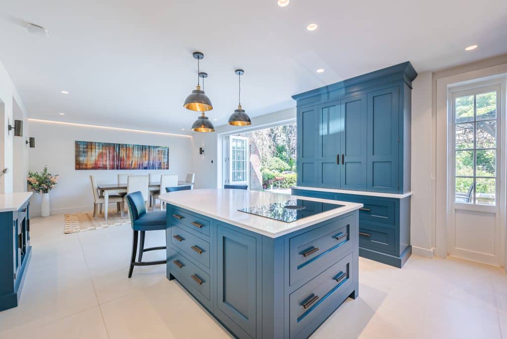 a room filled with furniture and a large window
