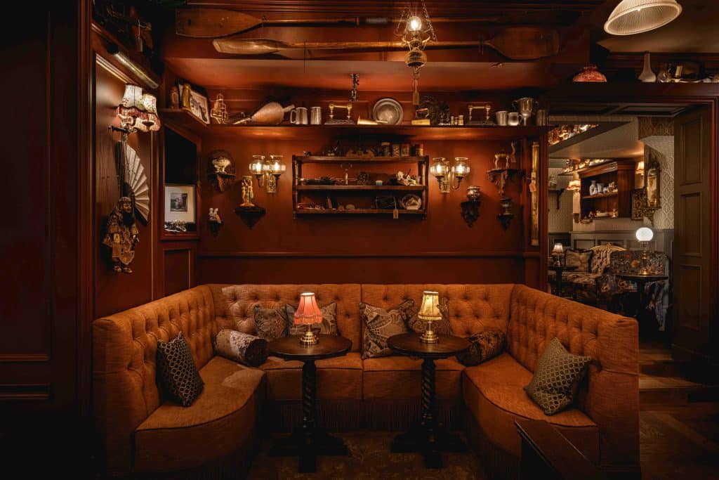 a living room filled with furniture and a fireplace