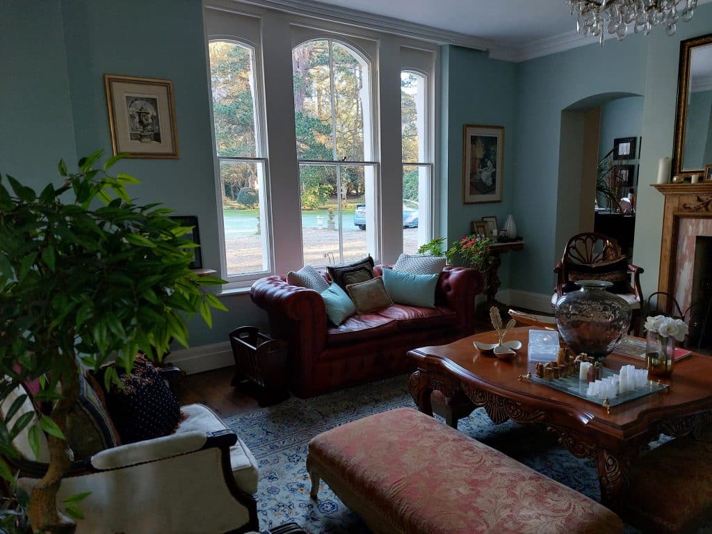 a living room filled with furniture and a fire place