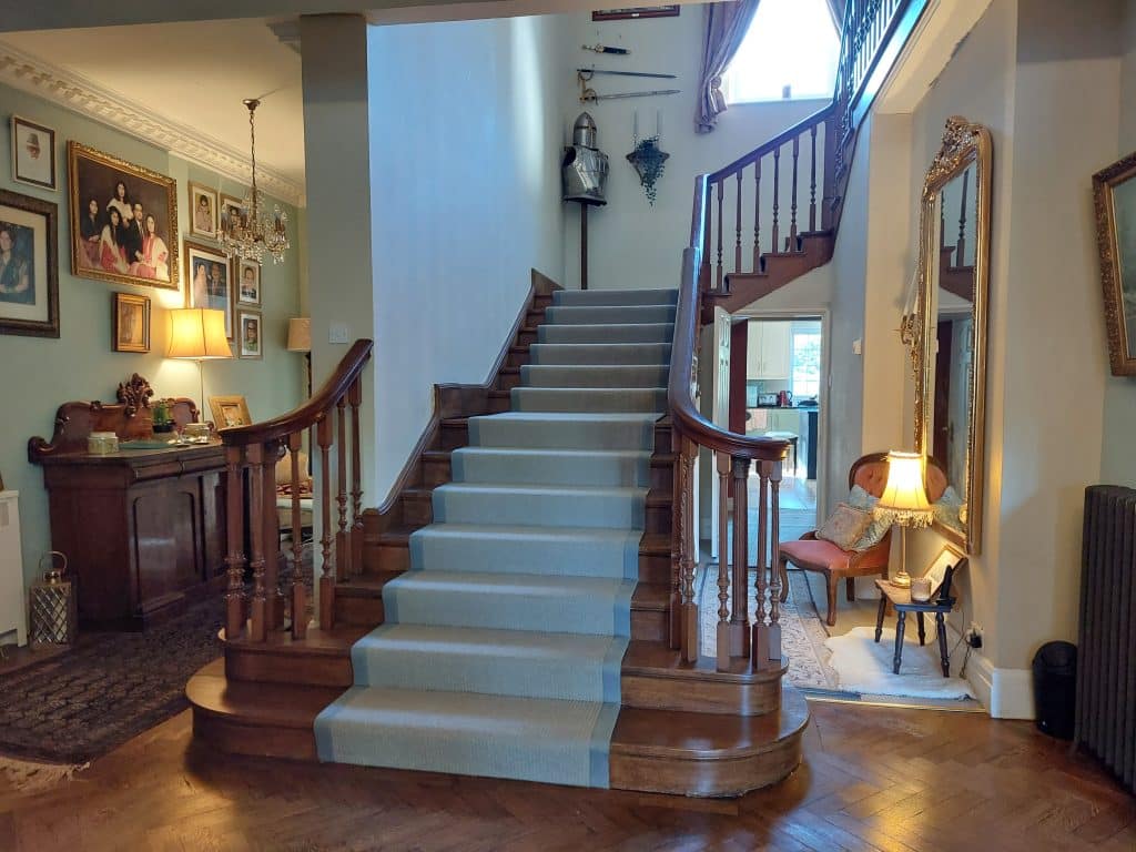 a room filled with furniture and a fire place