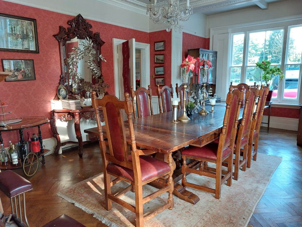 a living room filled with furniture and a large window