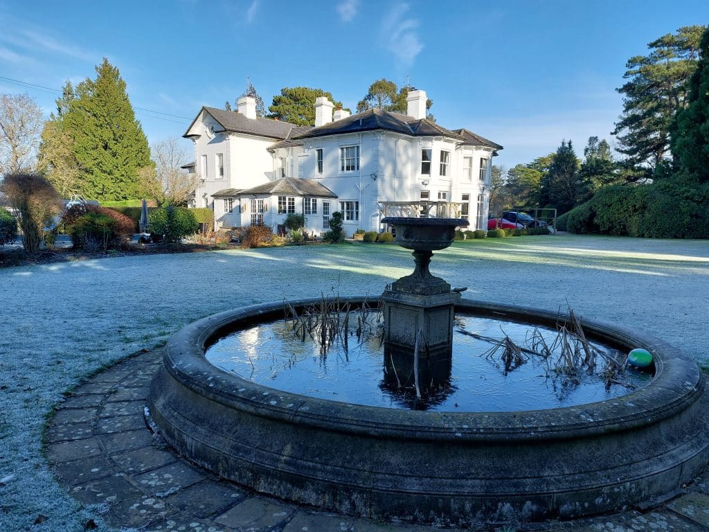a fountain in front of a building