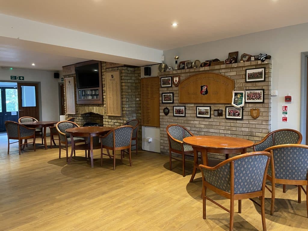 a living room filled with furniture and a table