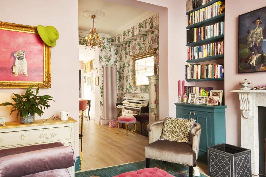 a living room filled with furniture and a fire place