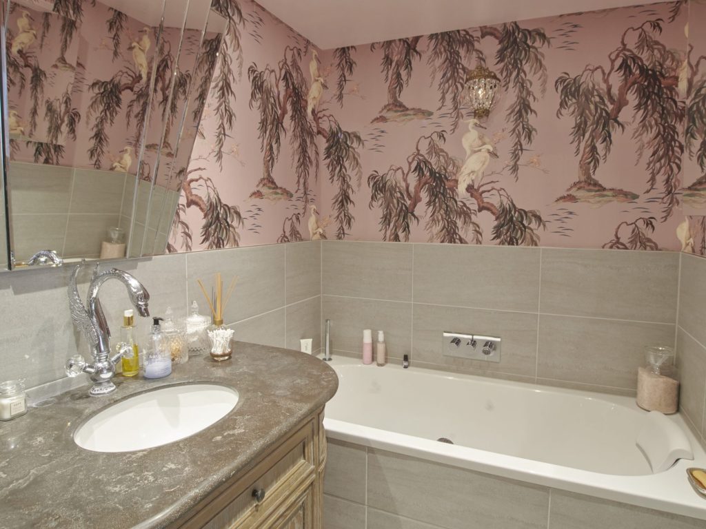 a double sink and large mirror