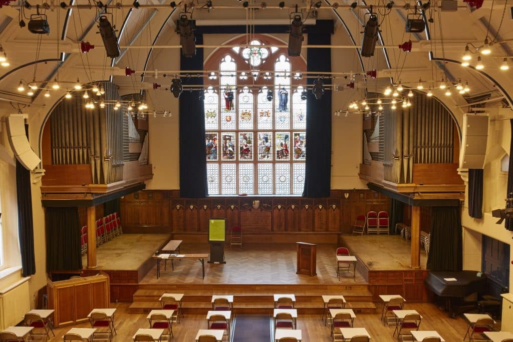 a room filled with furniture and a fireplace