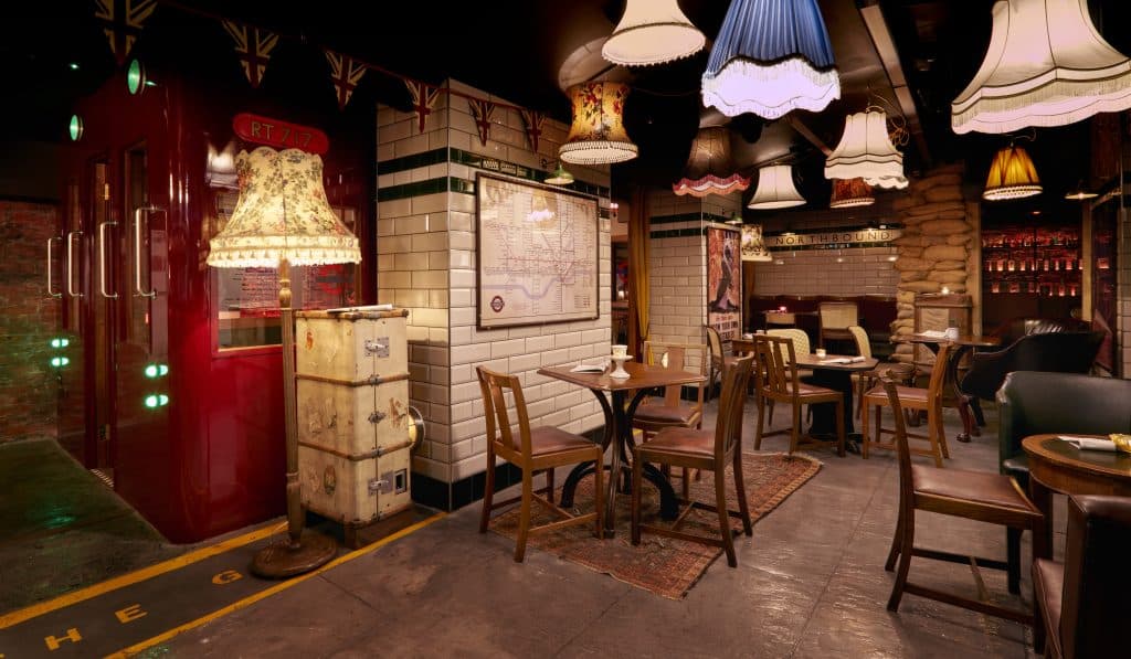 a room filled with furniture and a fireplace