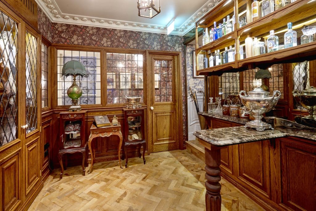 a room filled with furniture and a large window