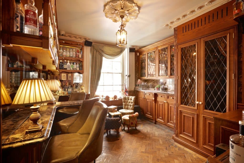 a room filled with furniture and a fireplace
