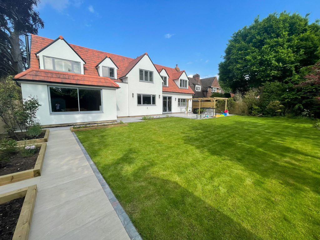 a house with a green field