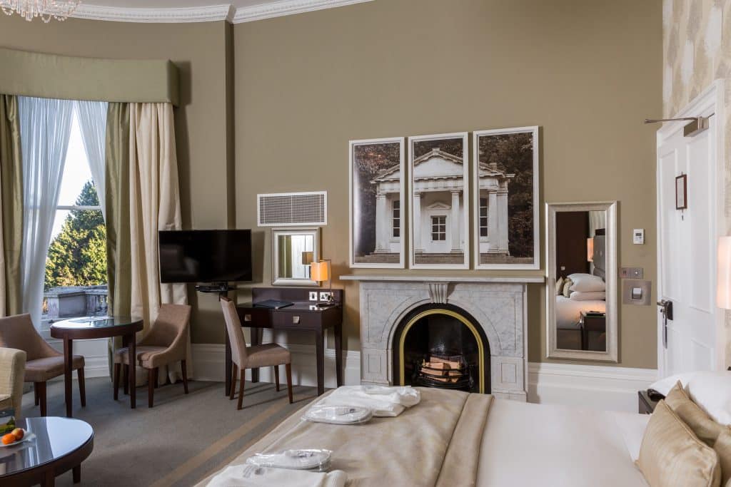 a living room filled with furniture and a large window