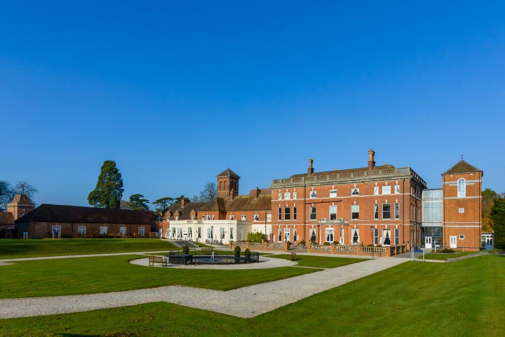 a castle on top of a grass covered field