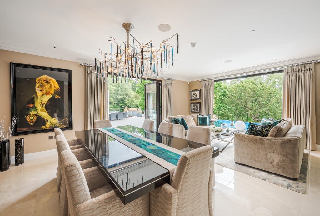 a room filled with furniture and a large window