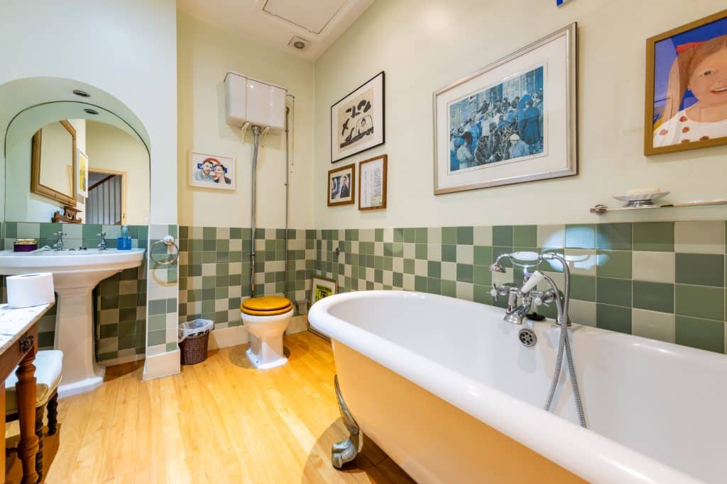 a room with a sink and a mirror