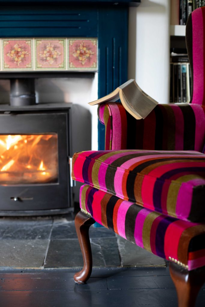 a close up of a fire place sitting in a room