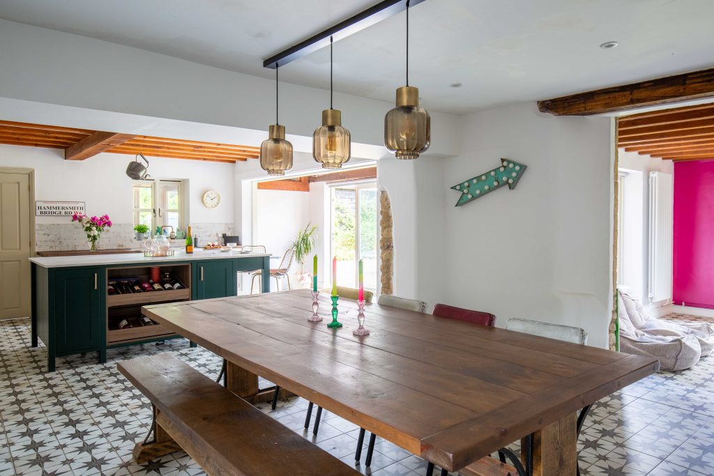 a living room with a wooden counter