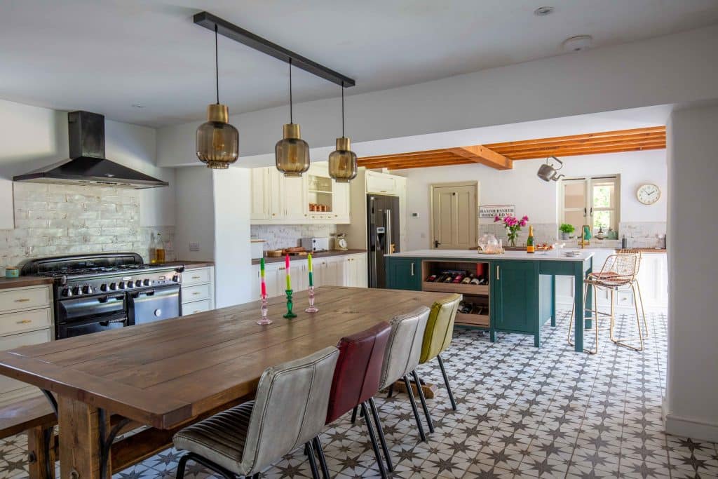 a kitchen with a dining room table