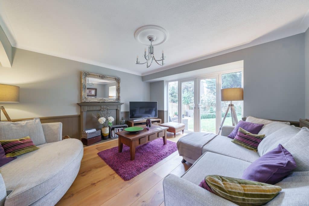 a bedroom with a bed in a room