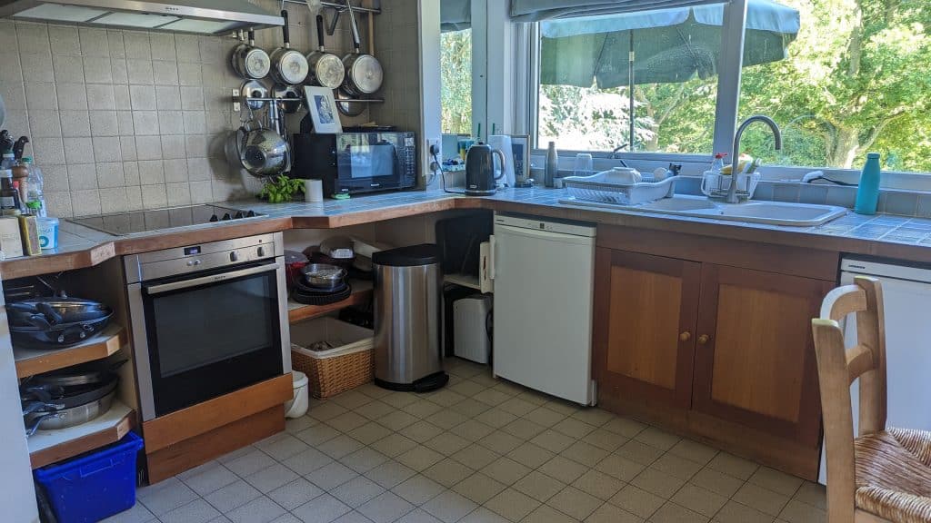 a kitchen with a sink and a window