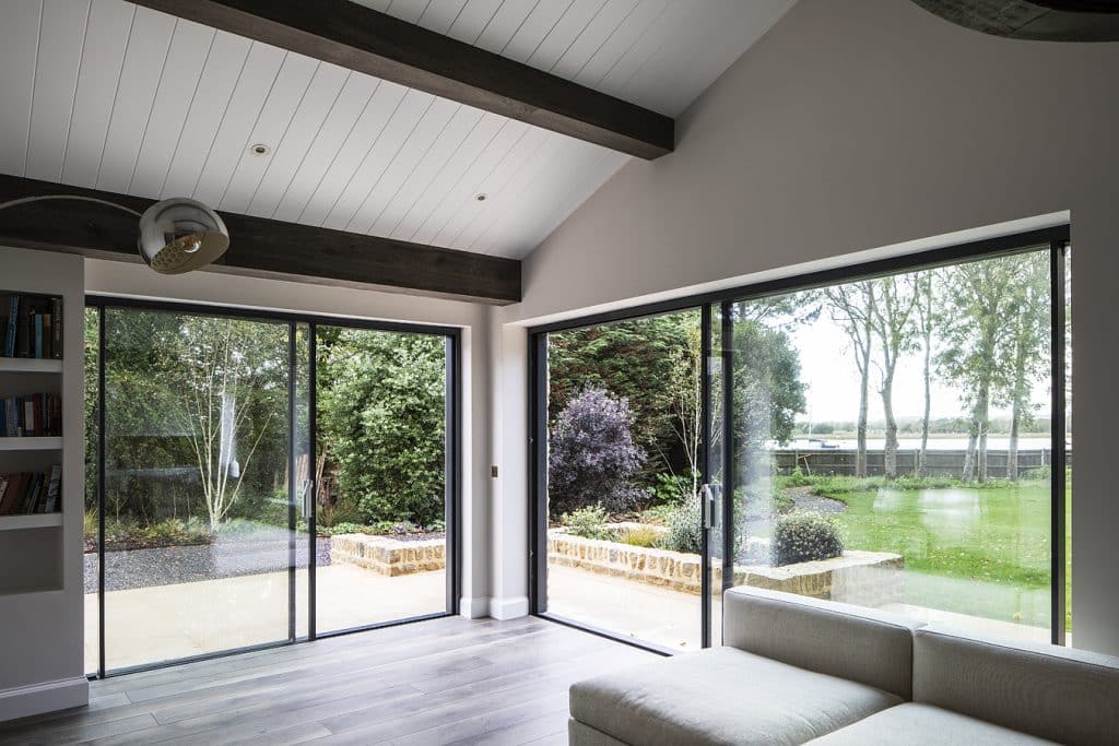 a view of a living room with a large window