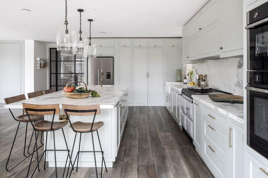 a kitchen with a table in a room