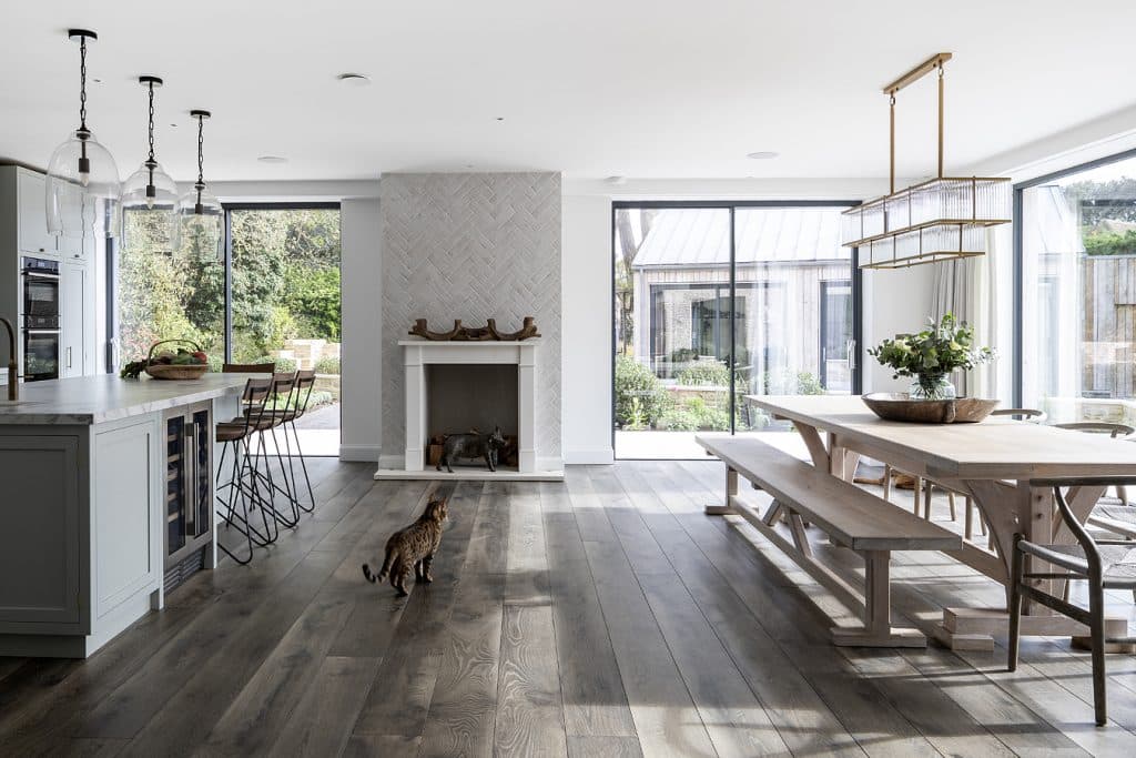 a living room filled with furniture and a large window