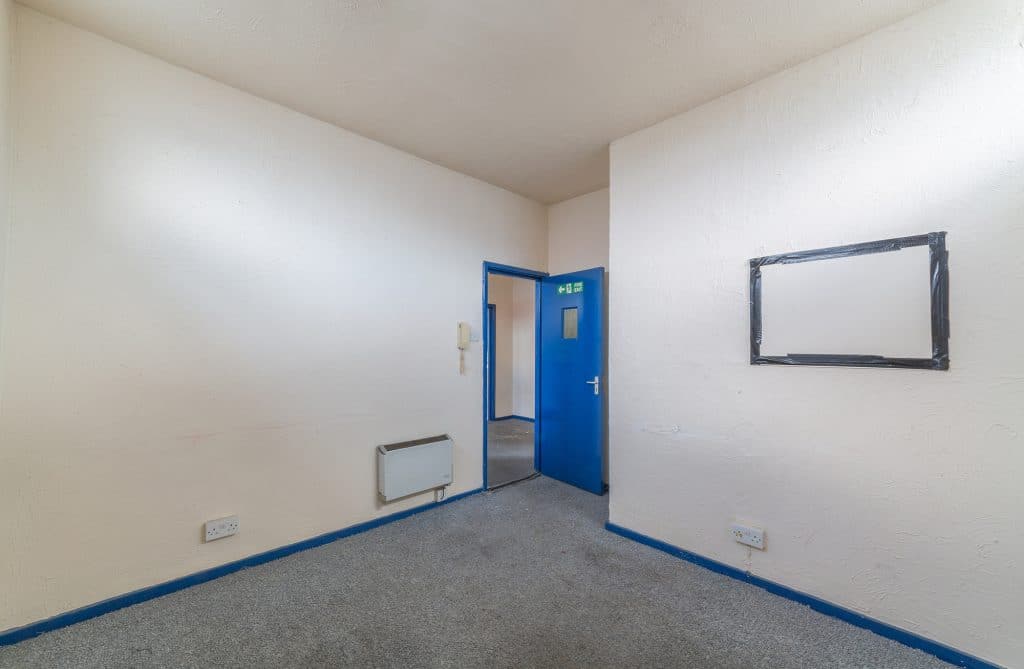 a room with a blue background