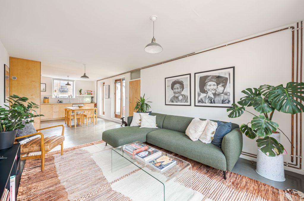 a living room filled with lots of furniture
