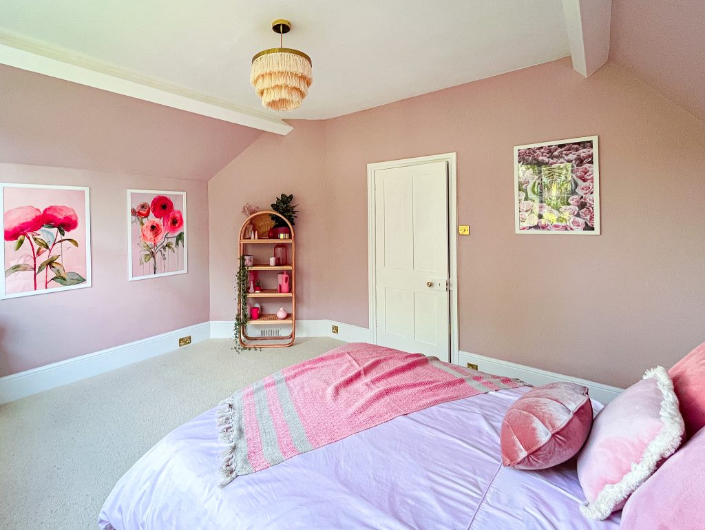 a bedroom with a bed in a room