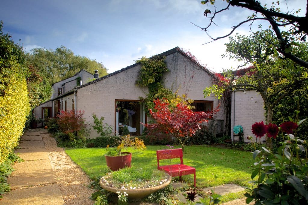 a small house in a garden