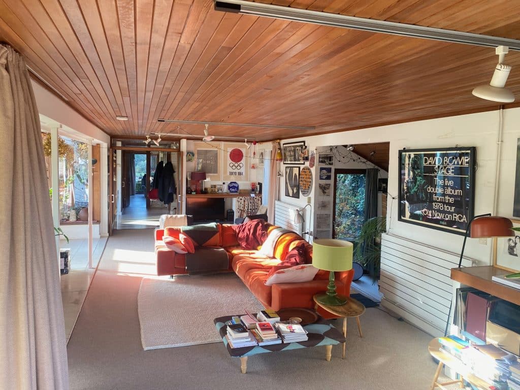 a room filled with furniture and a table