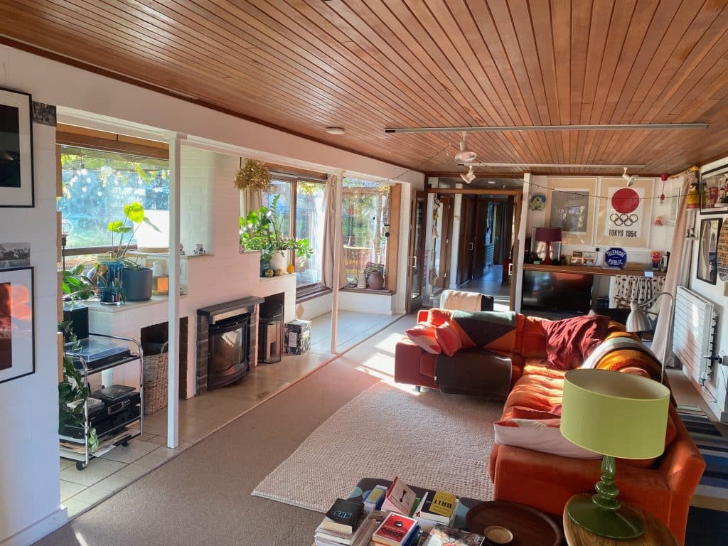 a room filled with furniture and a fire place