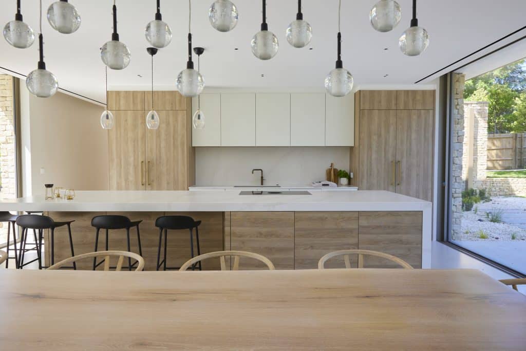a kitchen with wooden cabinets