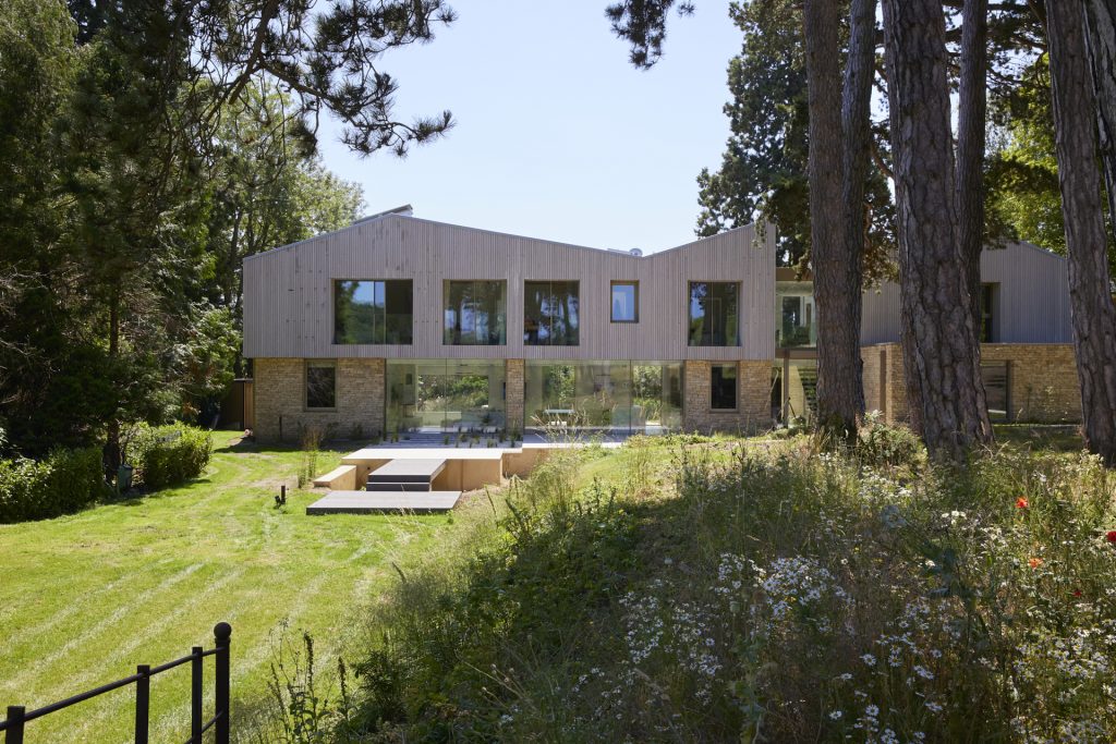 a tree in front of a house