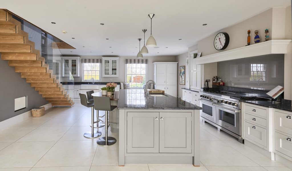 a kitchen with a lot of furniture in it