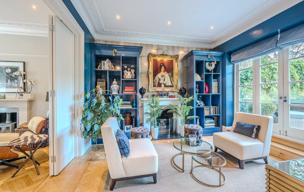 a living room filled with furniture and a fire place