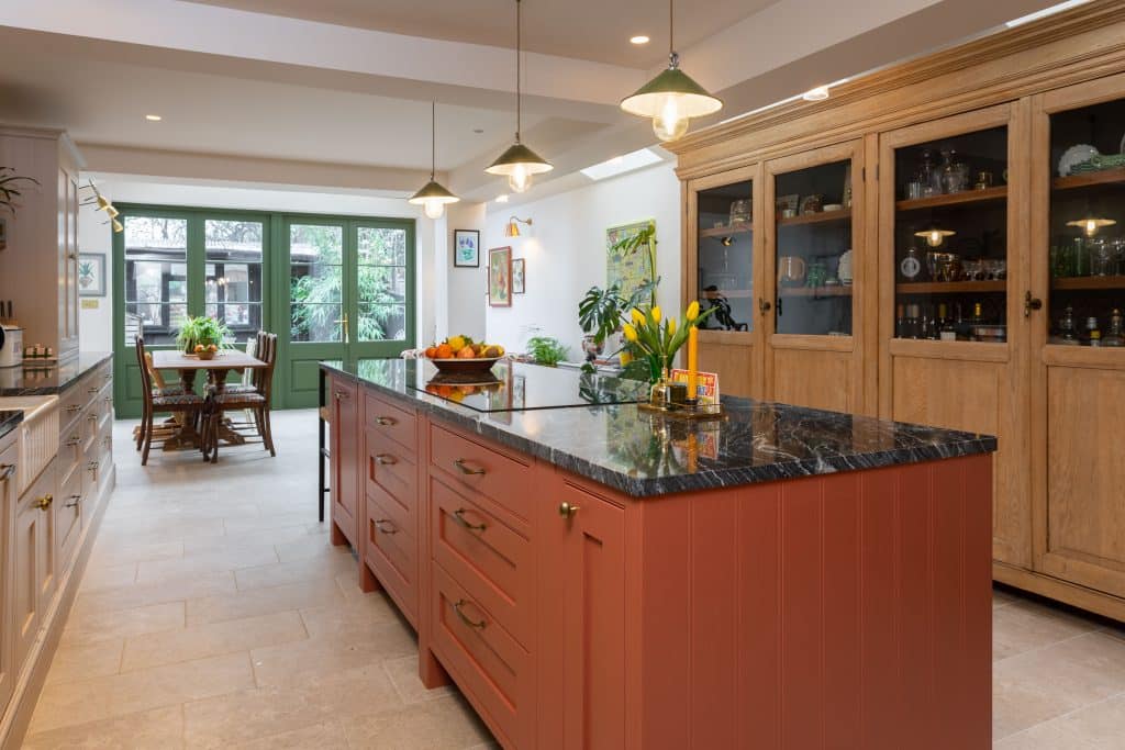 a large kitchen with an island in the middle of a room