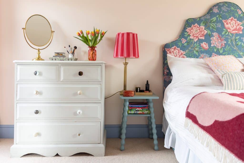 a bedroom with a bed in a room