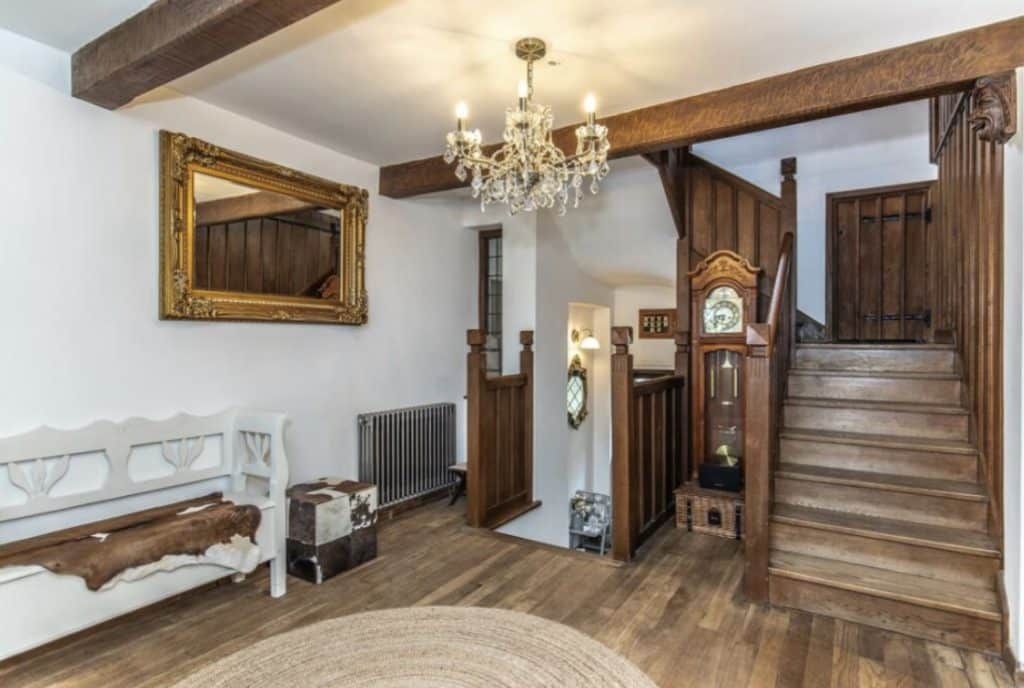 a living room with a large mirror