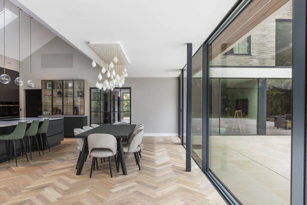 a living room filled with furniture and a large window