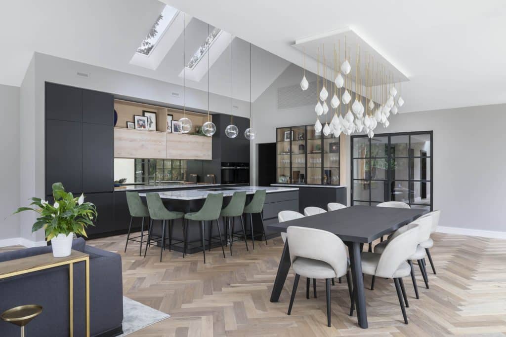 a living room filled with furniture and a large window